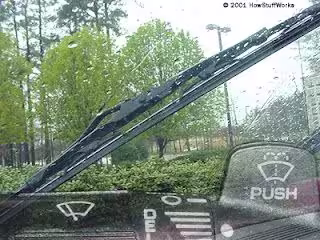 A view of the windshield from the inside of a car